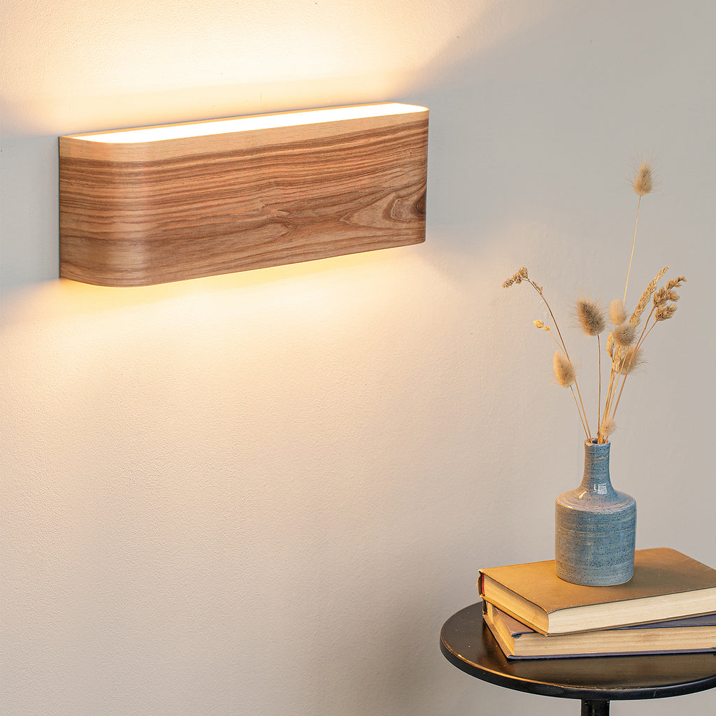 Wood sconce from curved ash veneer